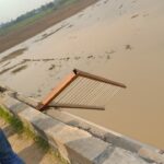 Tractor trolley railing fell under palanquin bridge due to failure of steering